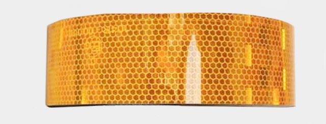 SÁRGA FÉNYVISSZAVERŐ SZALAG SZÉLESSÉGE 5 CM HOSSZA 25 MB.